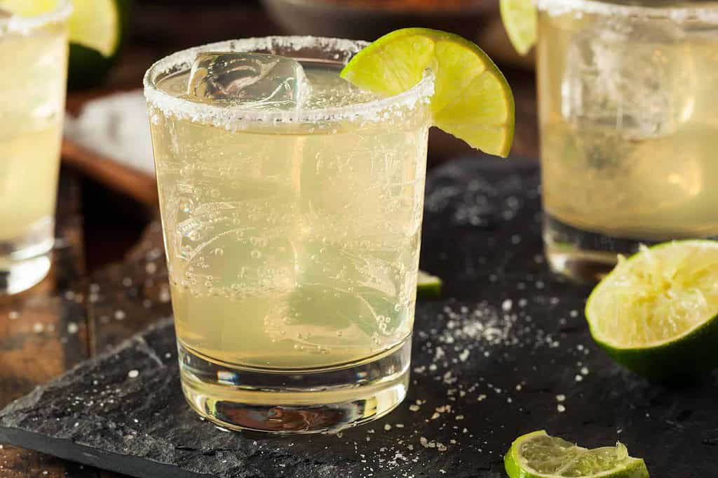 homemade classic margarita drink with lime and salt