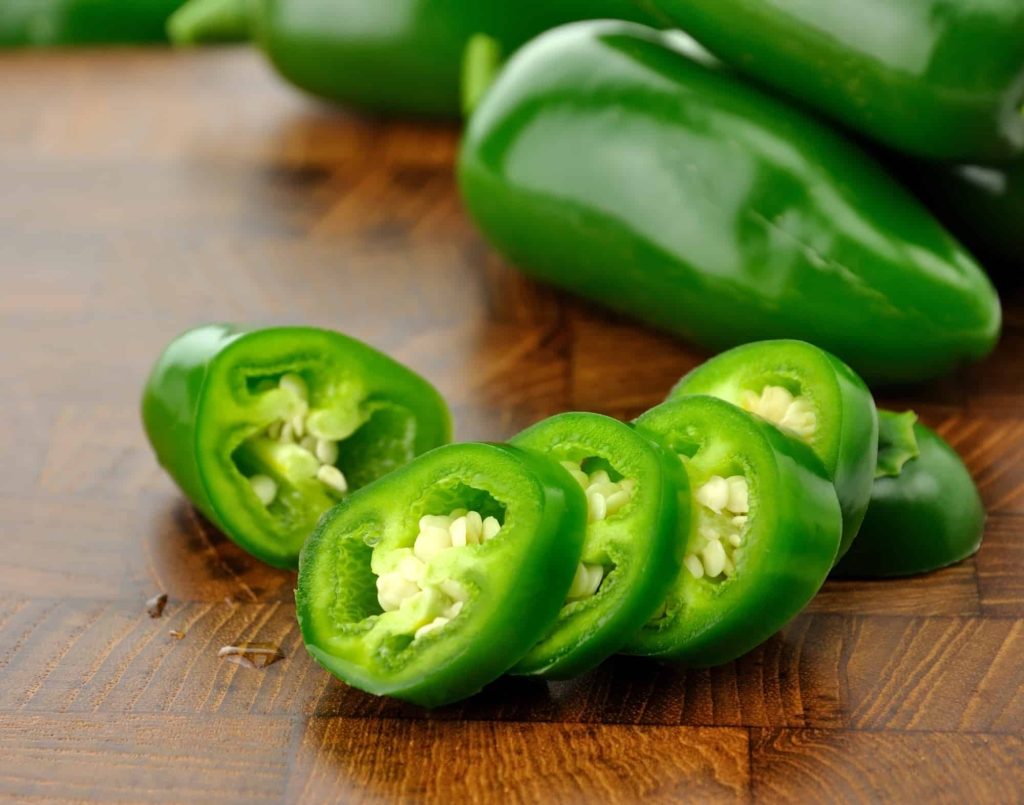 fresh sliced jalapeno with seeds