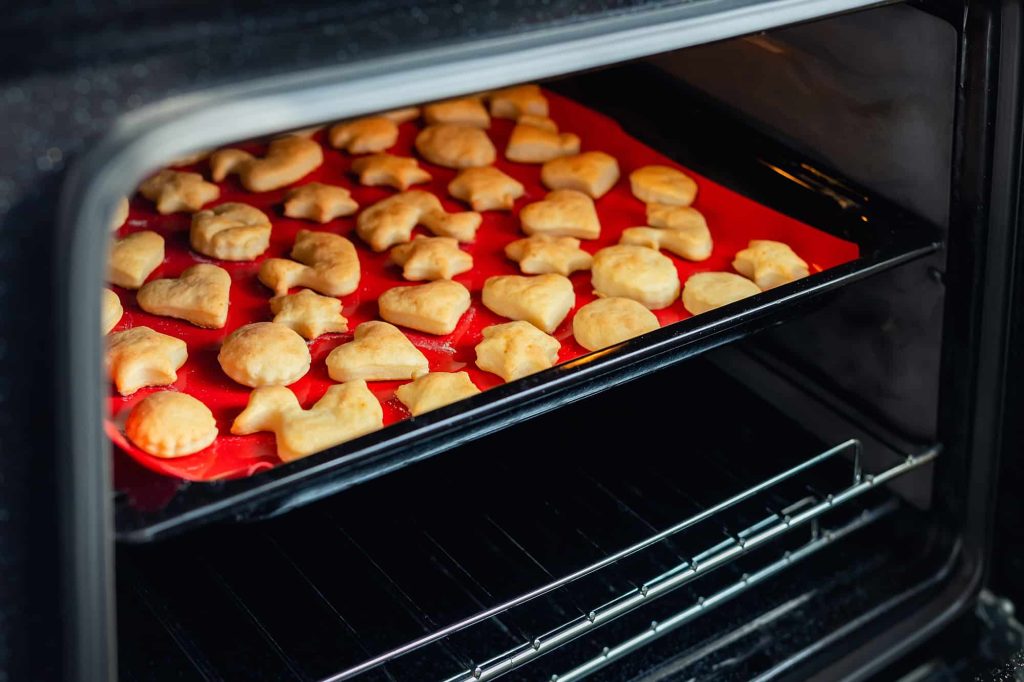 baking cookies on silicone mat in the oven